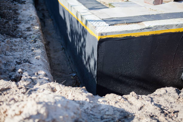 Professional Waterproofing technician working in Centreville, VA
